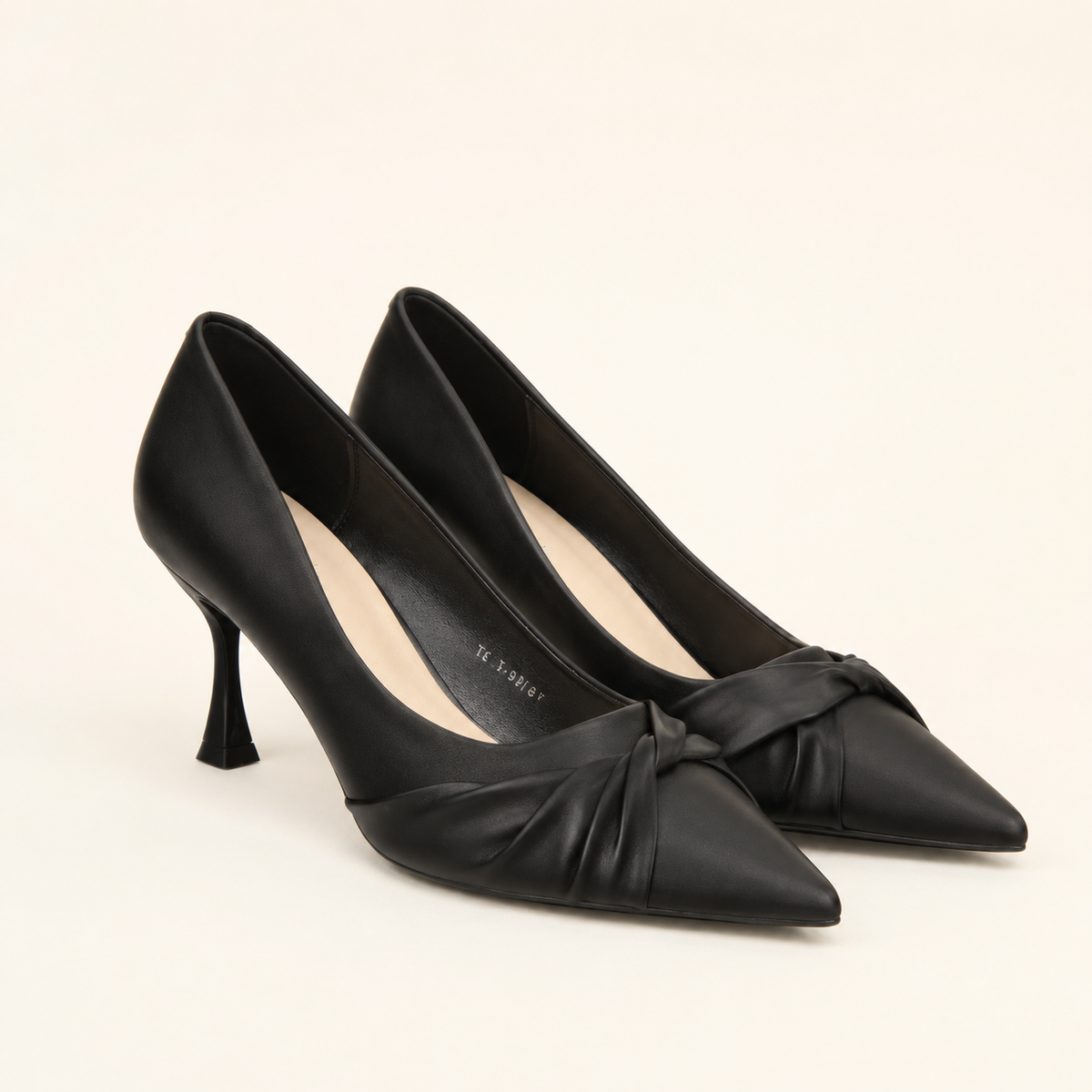 Off-white stiletto pumps in soft ivory shade