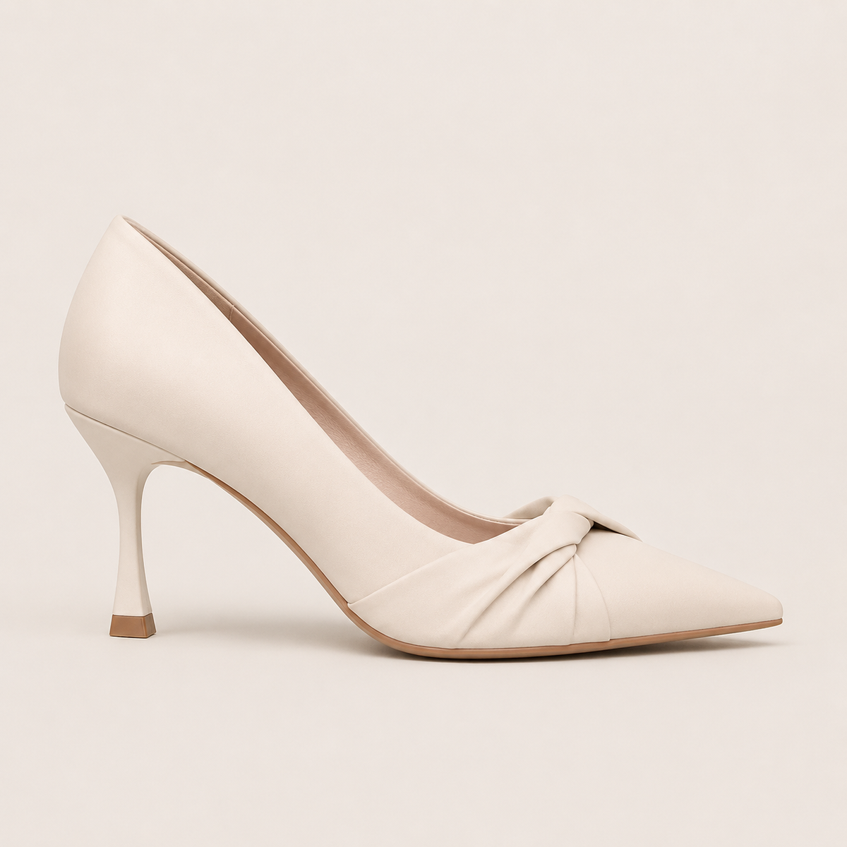 Off-white stiletto pumps in soft ivory shade