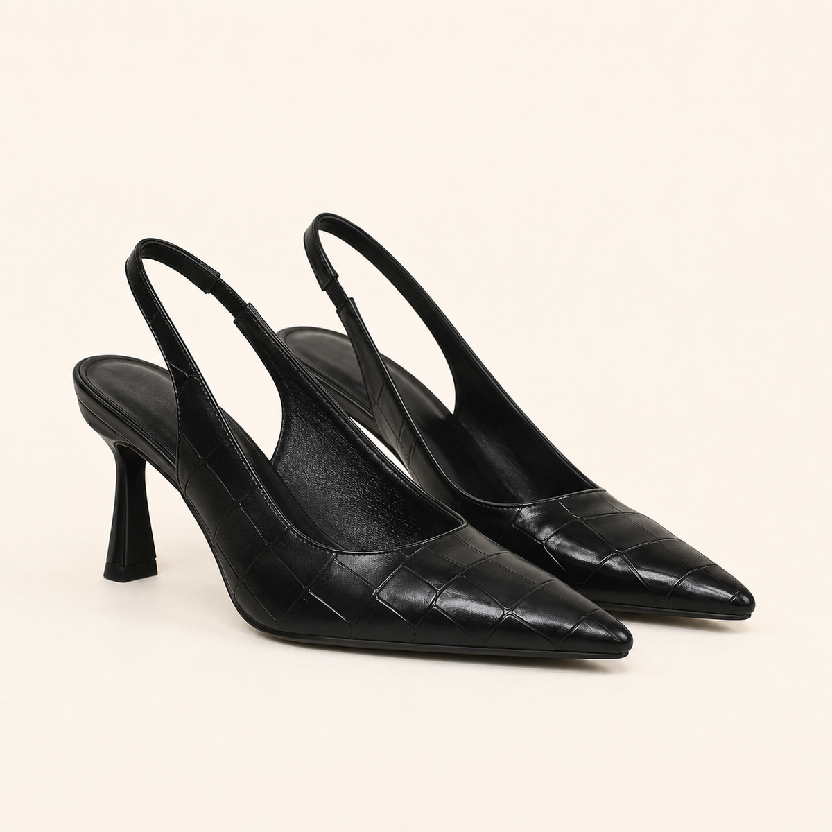 Pointed-toe high heel pumps in classic dress design