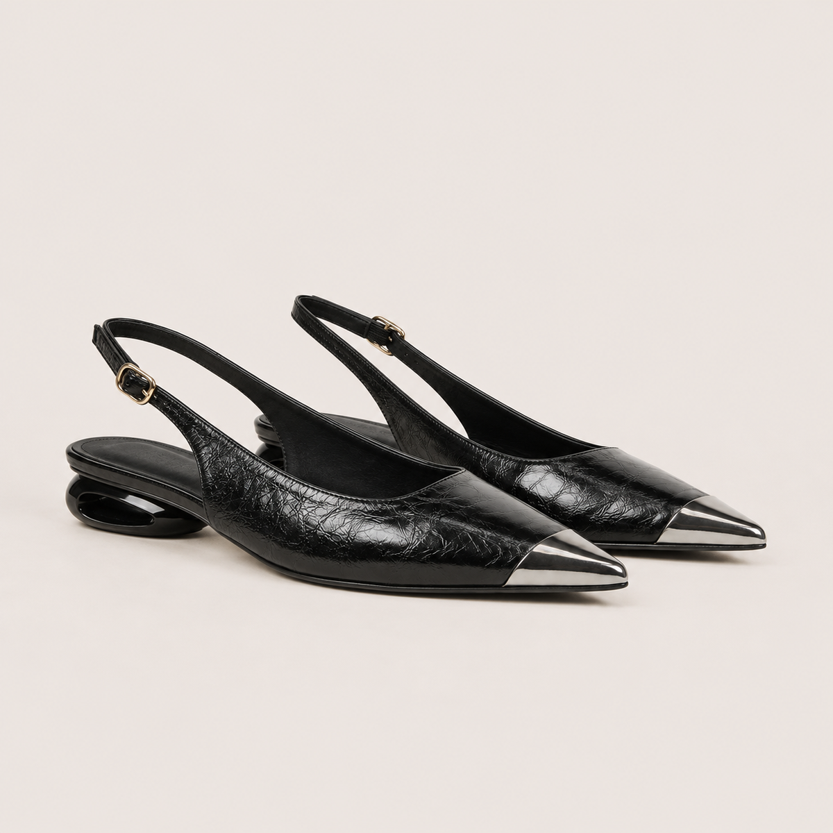 Silver low wedge heel pumps in metallic finish