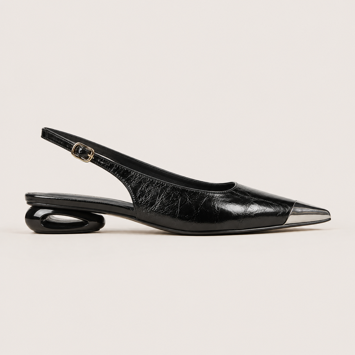 Silver low wedge heel pumps in metallic finish