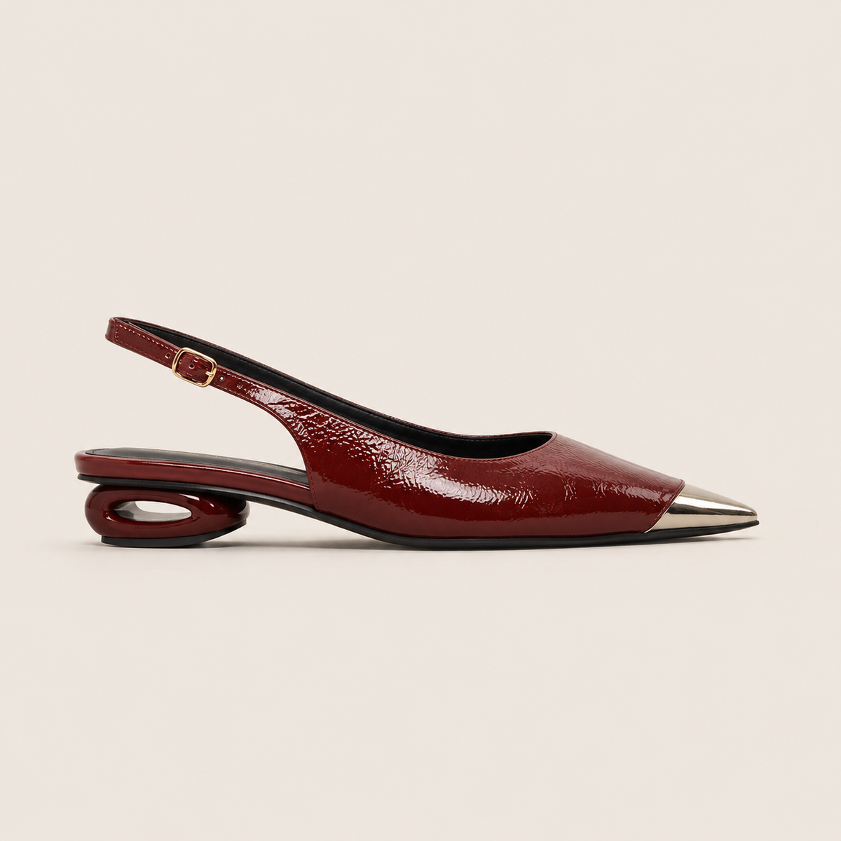 Silver low wedge heel pumps in metallic finish