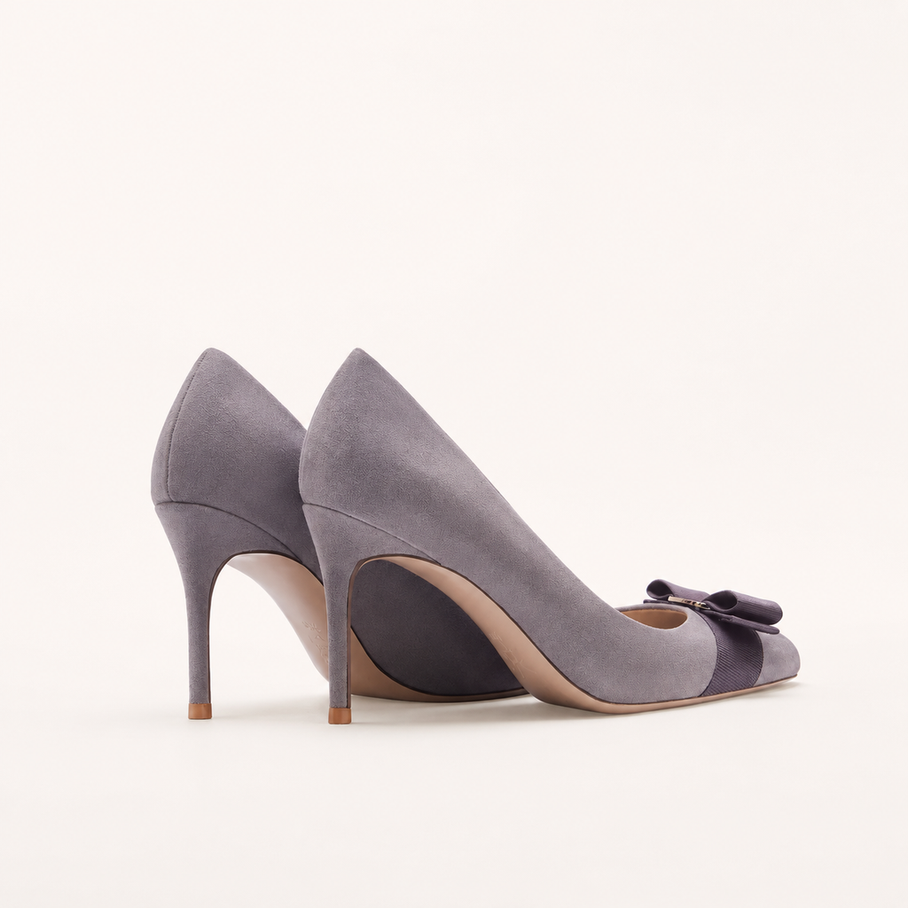Faux suede bow pumps with round toe design