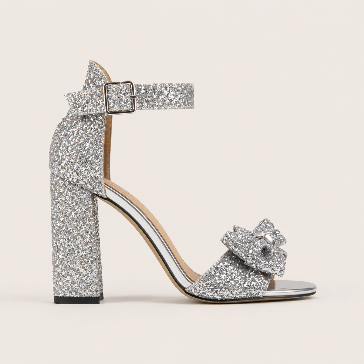 Silver patent high heel mules with decorative bow