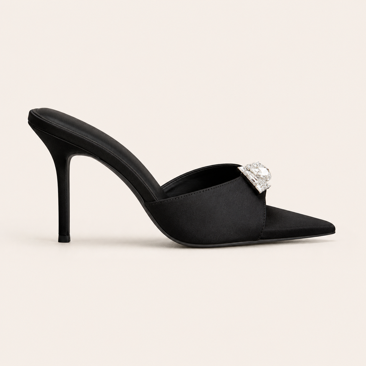White satin sandals with rhinestone accents and stiletto heel
