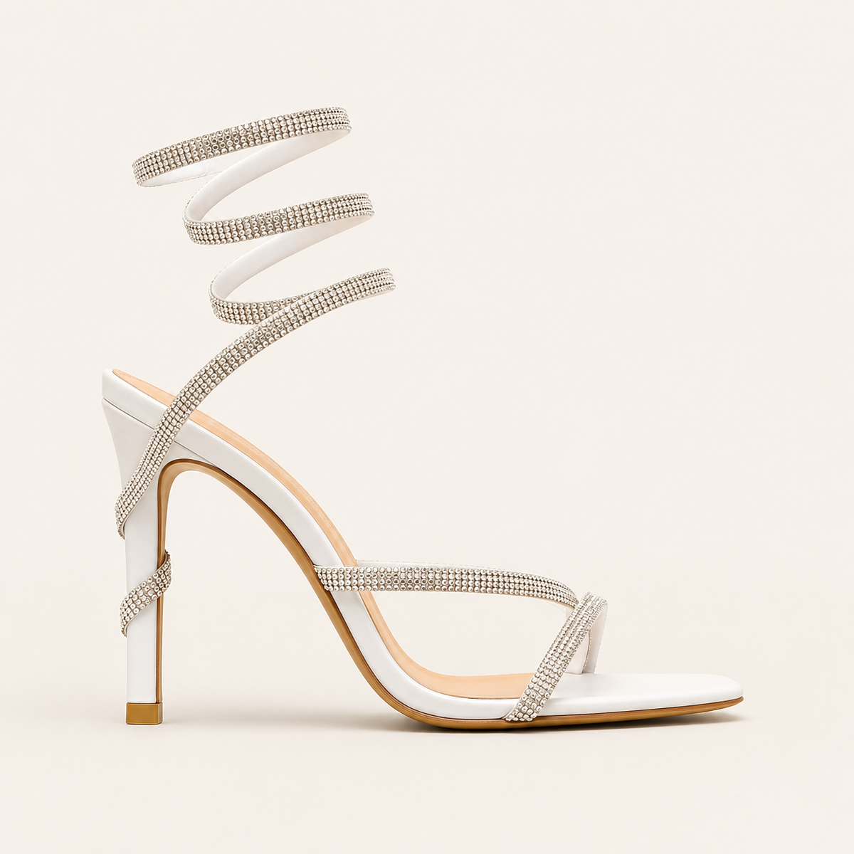 Sculptural snake heel sandals with signature designer detail