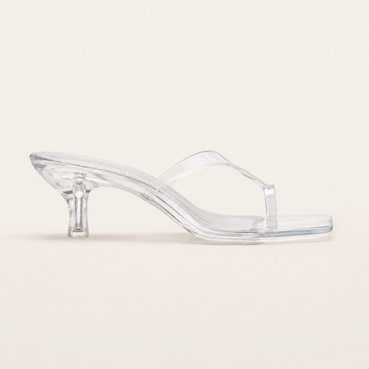 Clear kitten heel sandals with modern square toe design