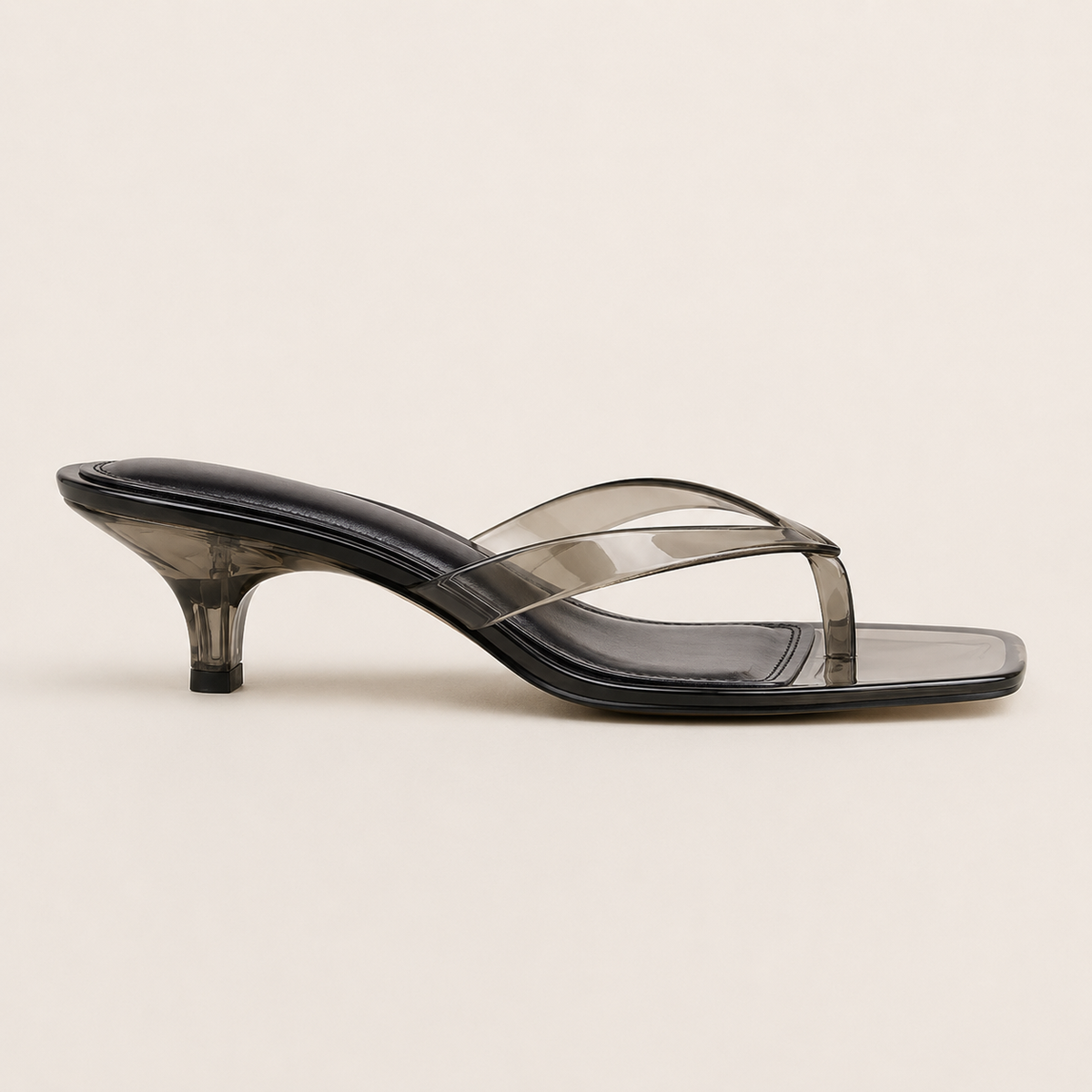 Clear kitten heel sandals with modern square toe design