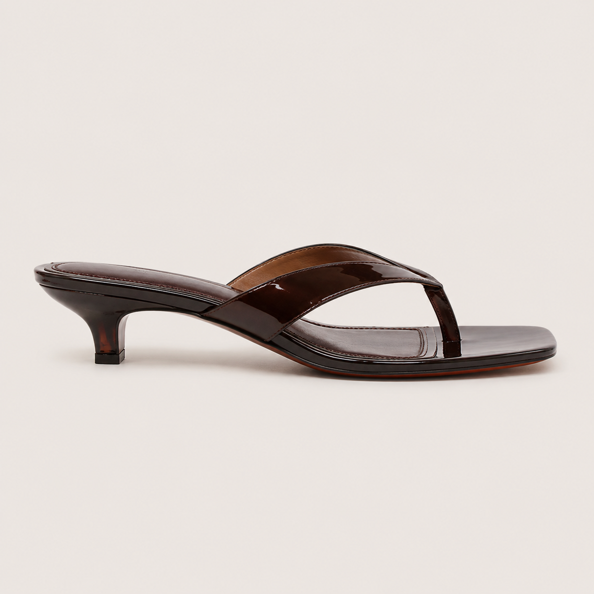 Clear kitten heel sandals with modern square toe design