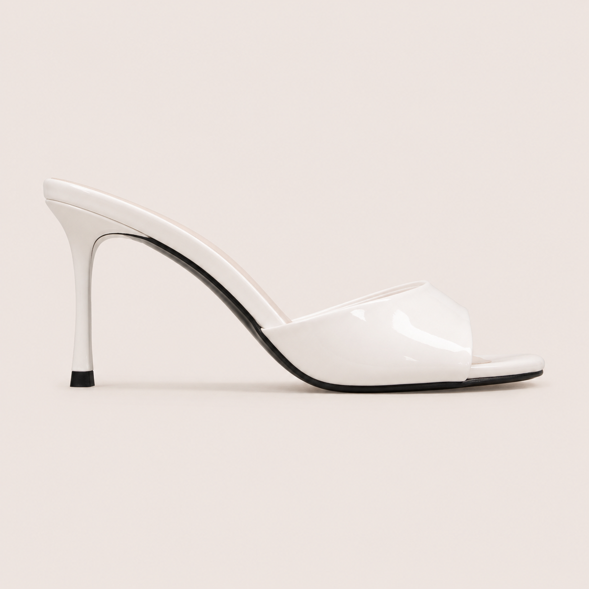 Patent stiletto heeled sandals in glossy finish