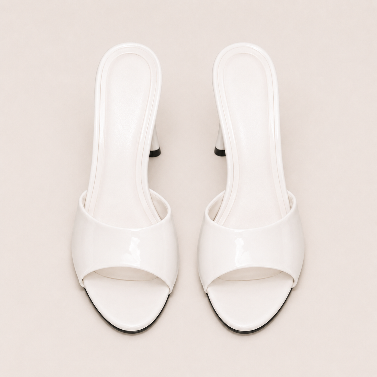 Patent stiletto heeled sandals in glossy finish