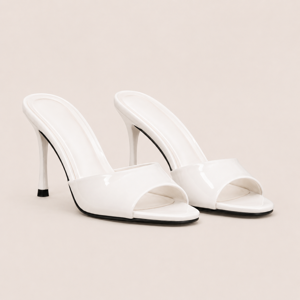 Patent stiletto heeled sandals in glossy finish
