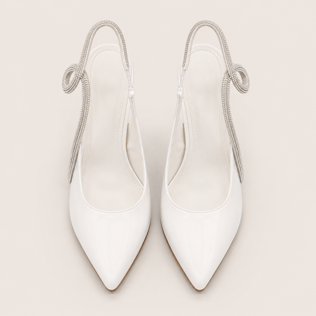 Slingback rhinestone pointed-toe pumps with sparkling details