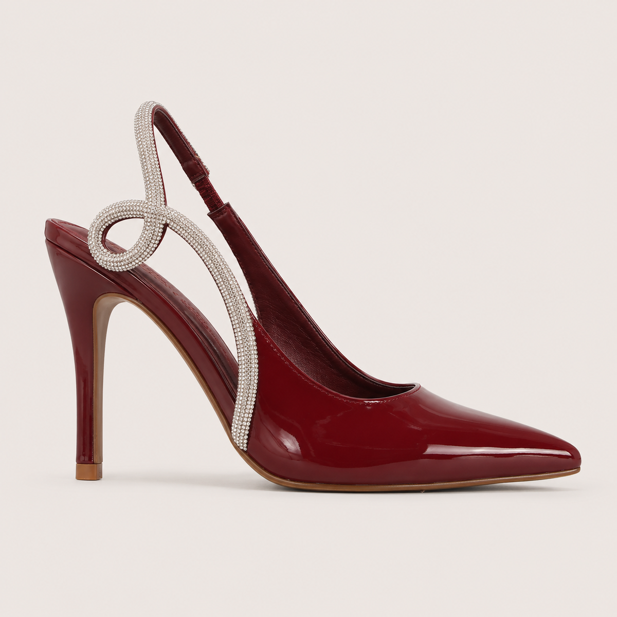 Slingback rhinestone pointed-toe pumps with sparkling details